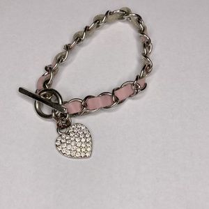 Silver chain and pink leather bracelet with rhinestone heart charm